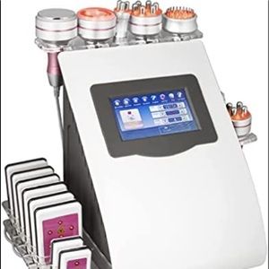 40k Brand New Cavi/Laser Machine includes wood roller. 7 heads 9 functions.